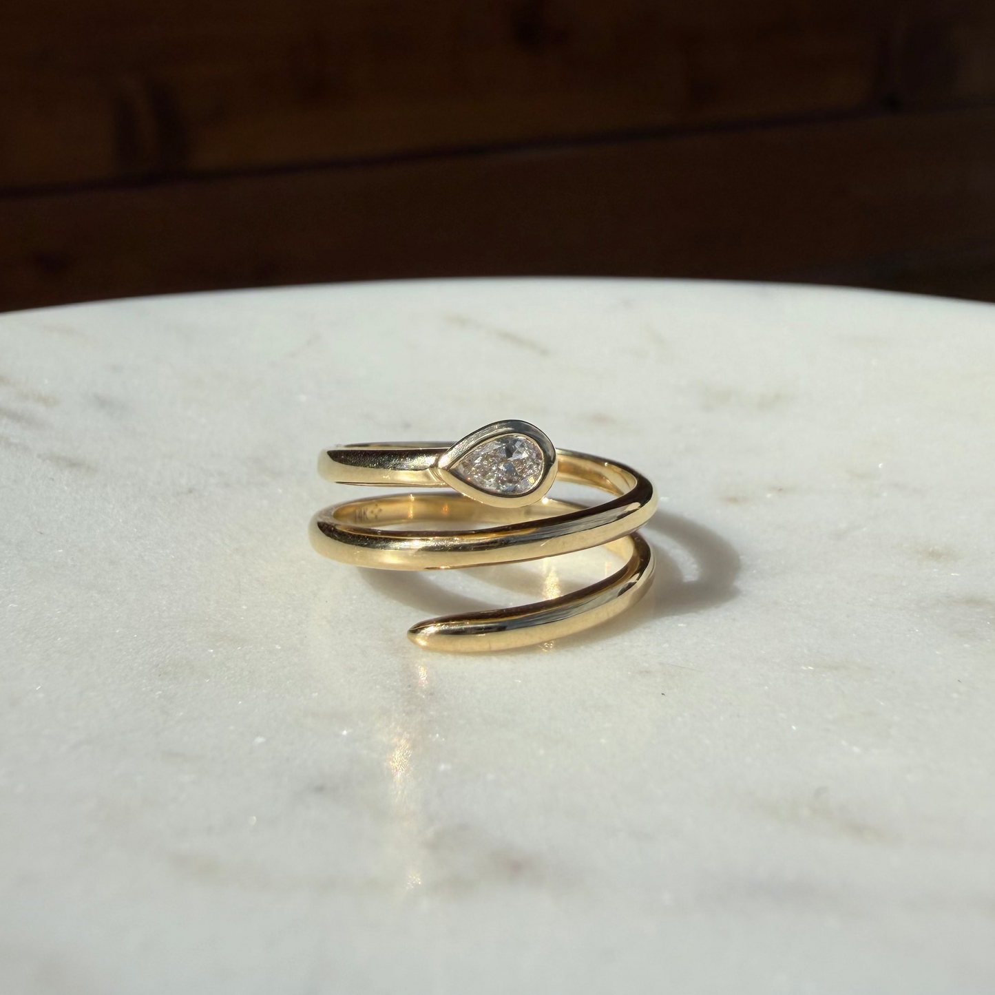 Bezel Pear Diamond Corkscrew Ring