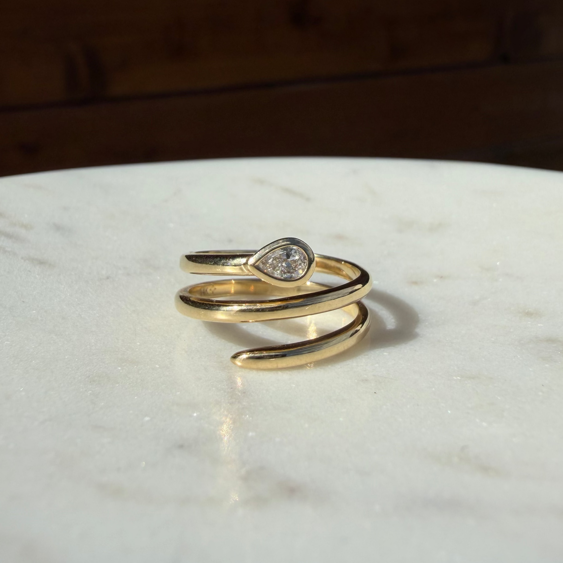 Bezel Pear Diamond Corkscrew Ring