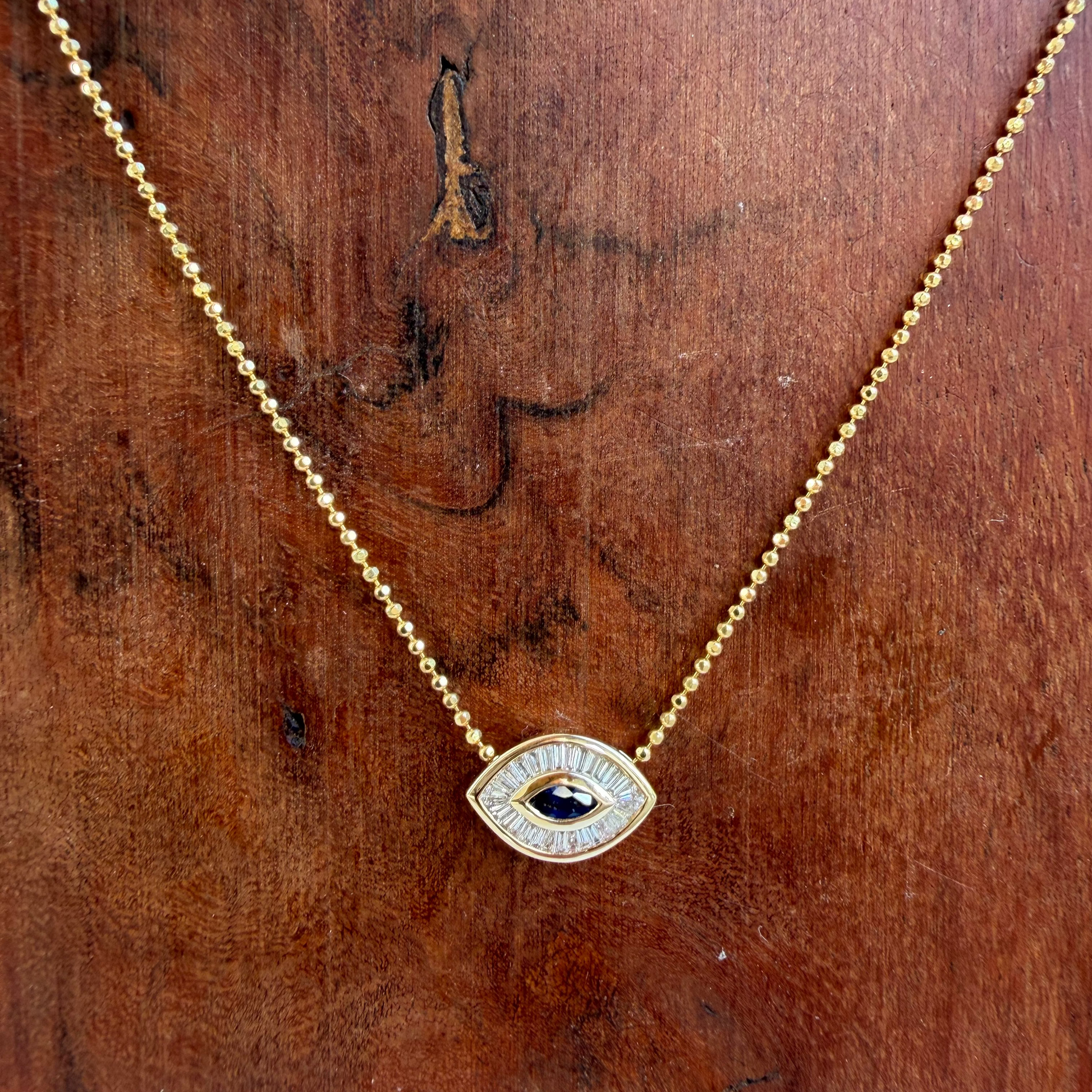 Baguette Evil Eye Glider with Sapphire Center